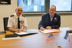 Two men sitting at a table
