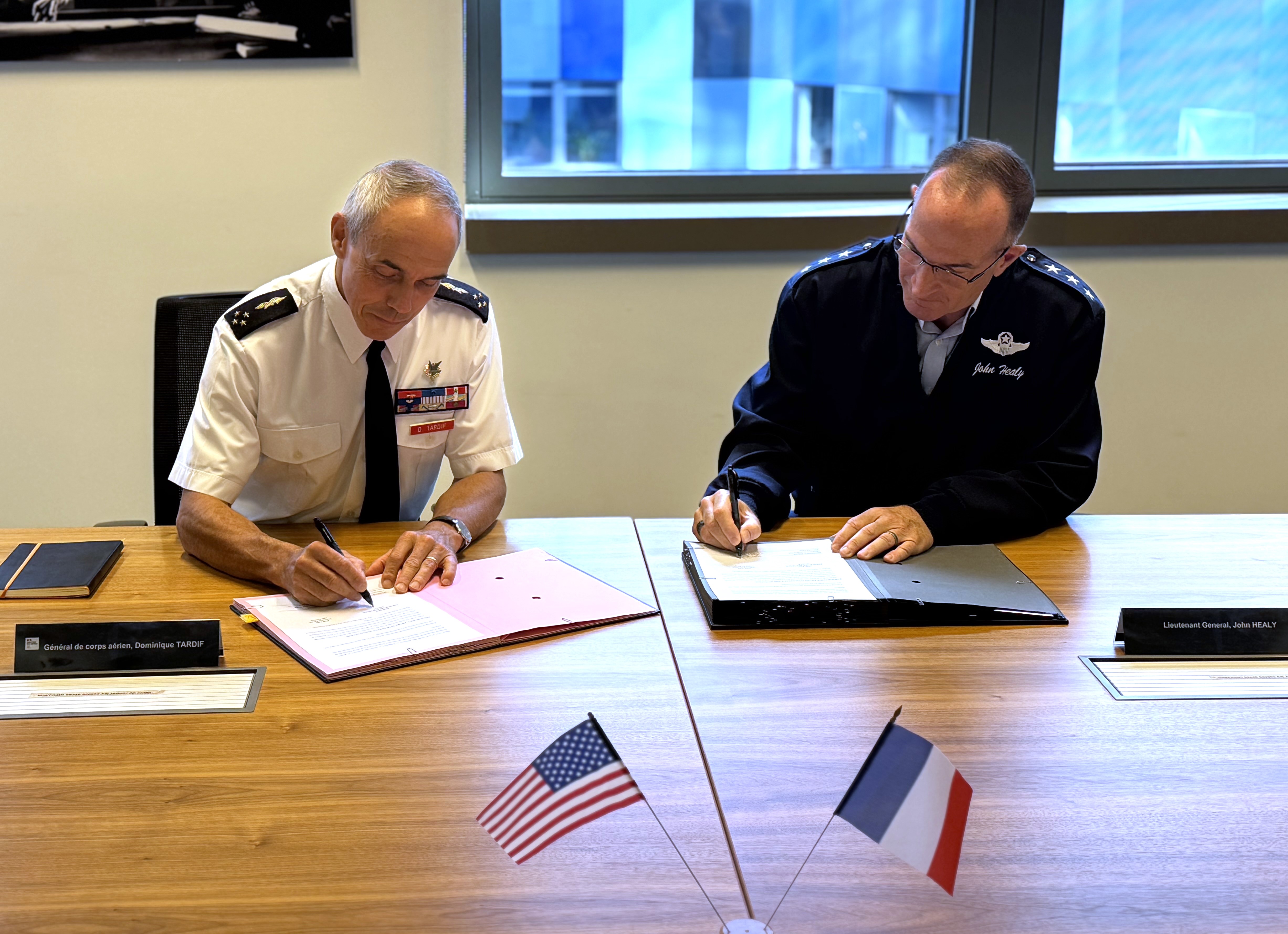 Lt. Gen. Dominique Tardif and Lt. Gen. John Healy sign Terms of Reference