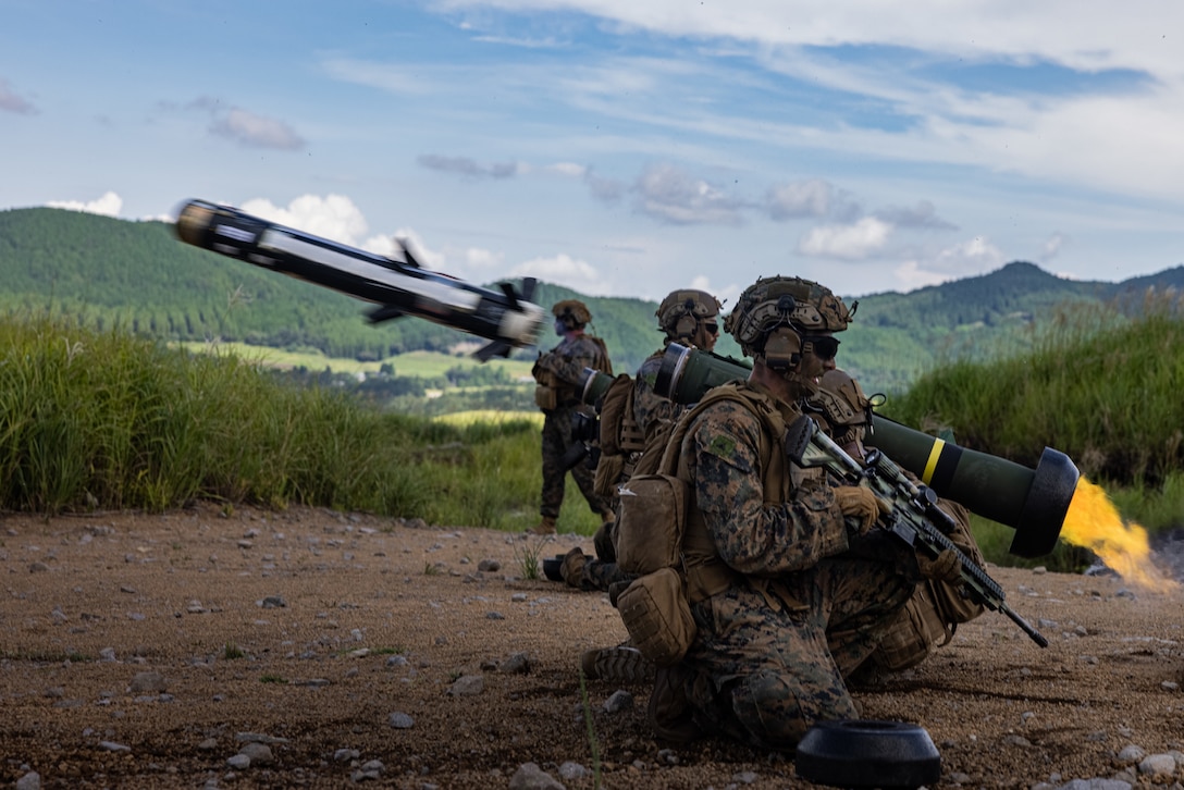 U.S. Marines with 12th Littoral Combat Team, 12th Marine Littoral Regiment, 3rd Marine Division, fire the FGM-148 Javelin during Resolute Dragon 25 at Hijudai Maneuver Area, Oita Prefecture, Japan, Sept. 15, 2025. Resolute Dragon is an annual bilateral exercise in Japan that strengthens the command, control, and multi-domain maneuver capabilities of U.S. Marines in III Marine Expeditionary Force and Japan Self-Defense Force personnel, with a focus on controlling and defending key maritime terrain. (U.S. Marine Corps photo by Lance Cpl. Rodney Frye)