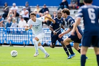 Airman playing soccer