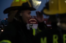 The 5th Civil Engineer Squadron’s fire protection team prepares for a live structure fire exercise at Minot Air Force Base, North Dakota, Sept. 16, 2025. It’s customary for firefighters to wear helmets that indicate their rank: white for chief, red for crew chief or captain, black for lieutenant and yellow for firefighter. (U.S. Air Force photo by Senior Airman Alyssa Bankston)