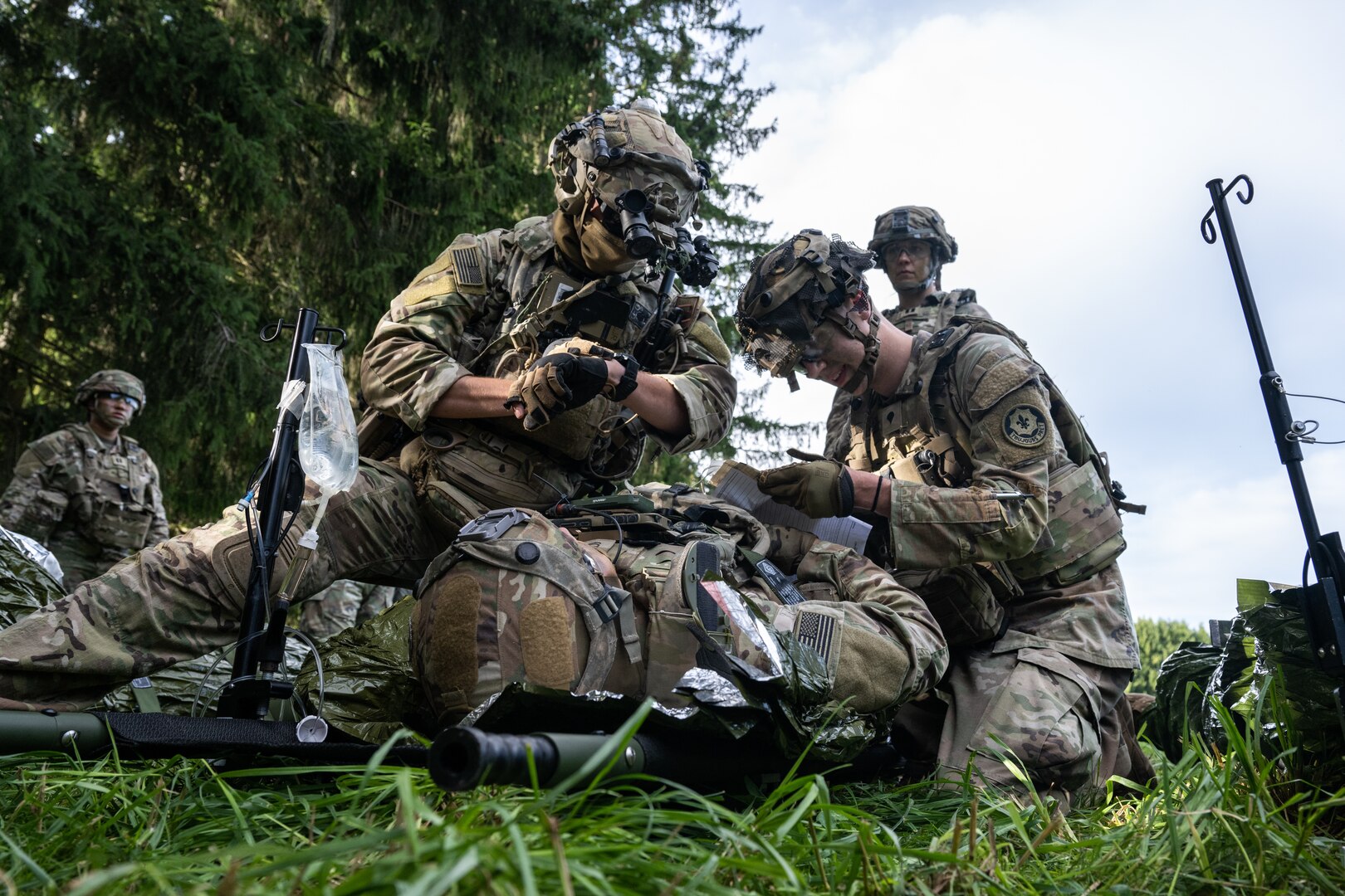 Airmen taking care of patient