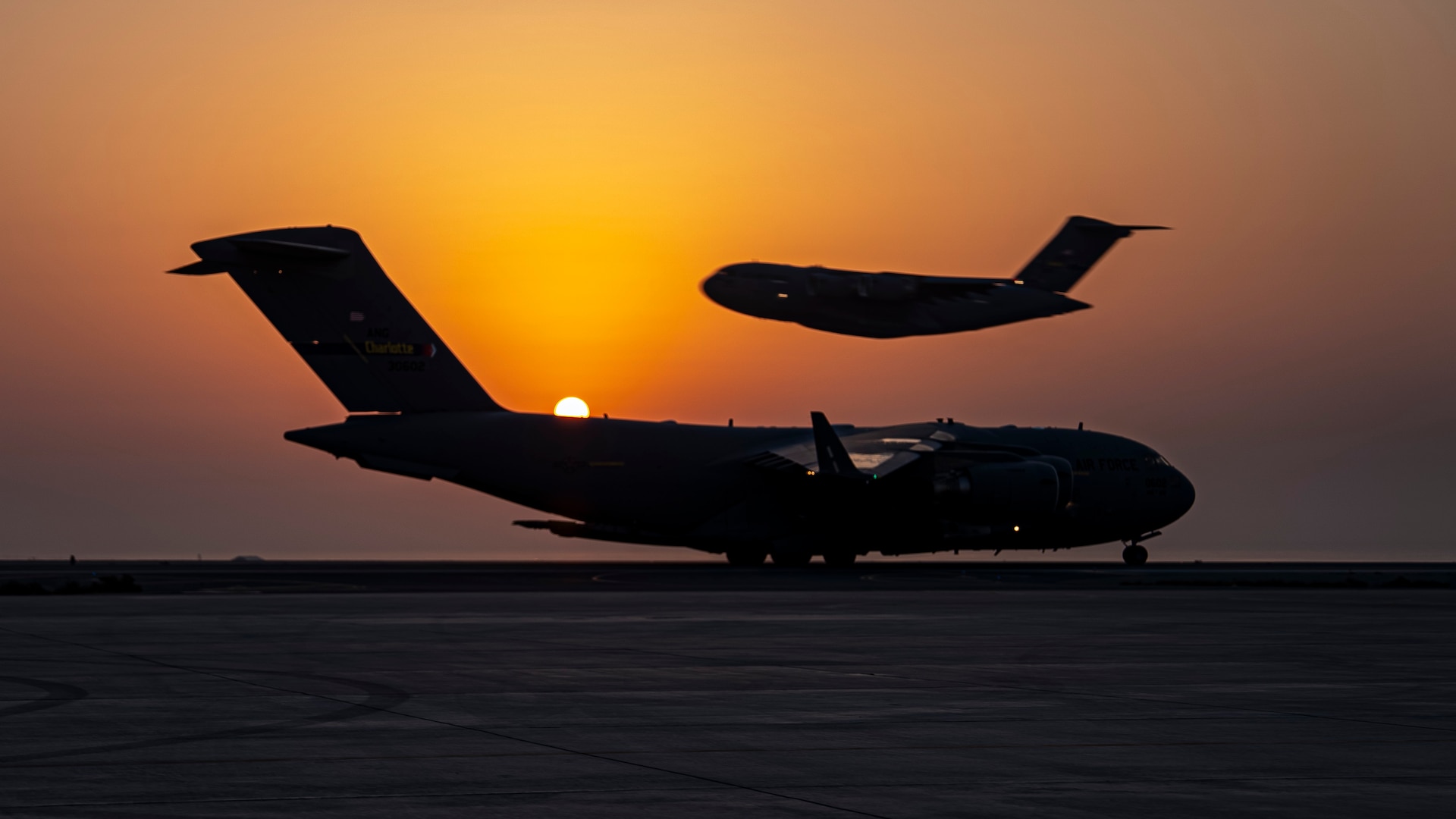 C-17s taking off and landing