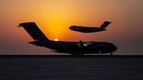 C-17s taking off and landing