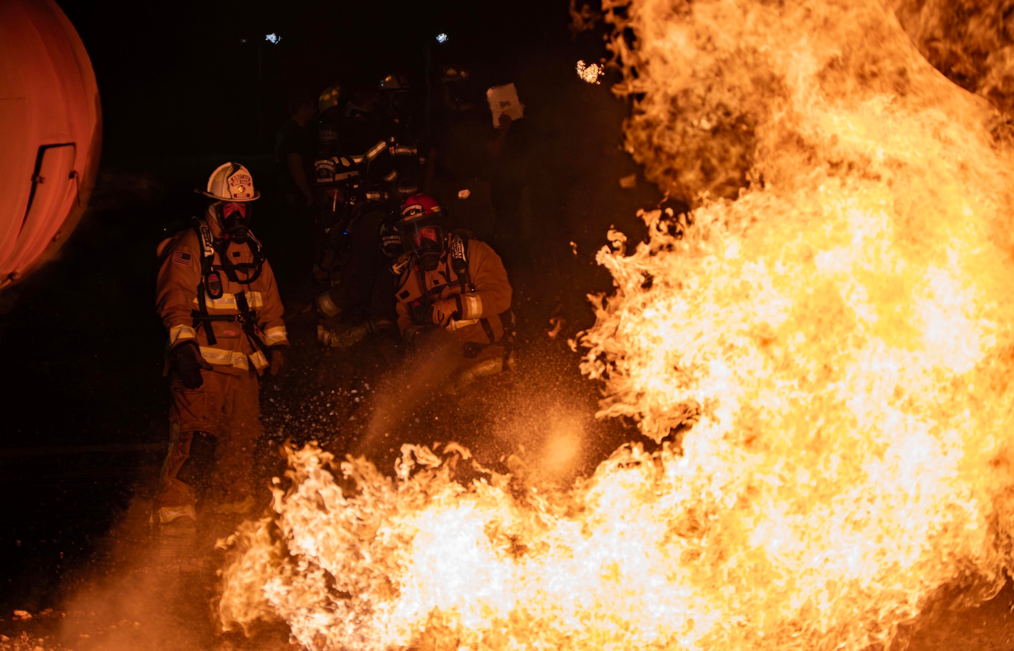 The 5th Civil Engineer Squadron’s fire protection team extinguishes an ongoing fire during a live aircraft fire exercise at Minot Air Force Base, North Dakota, Sept. 16, 2025. Fire prevention professionals must receive regular training to stay ready to handle everything from bush fires to flames caused by burning rocket fuel and hazardous materials. (U.S. Air Force photo by Senior Airman Alyssa Bankston)