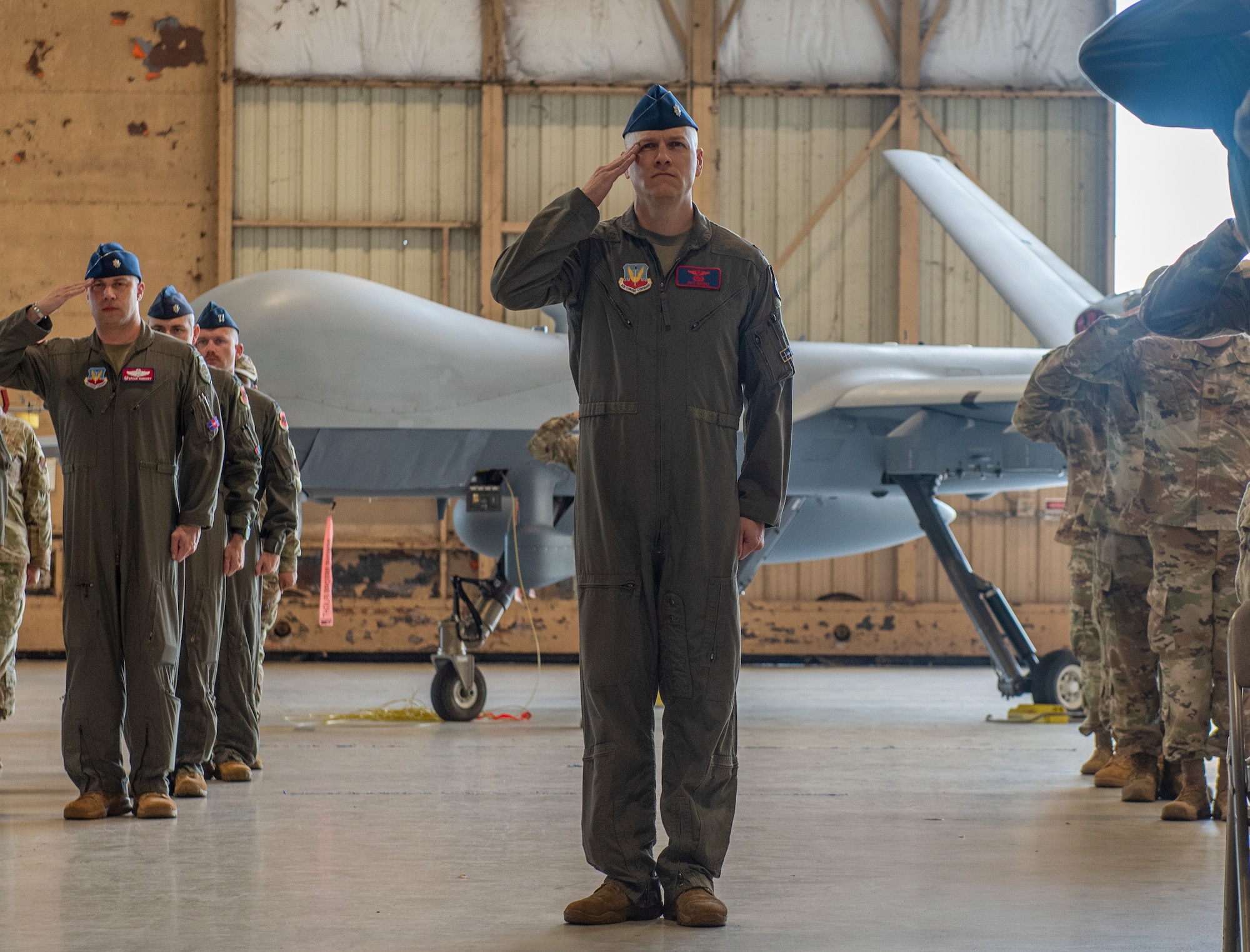 Members assigned to the new 25th Attack Wing render their first salute during a wing redesignation ceremony at Shaw Air Force Base, South Carolina, Sept. 18, 2025.