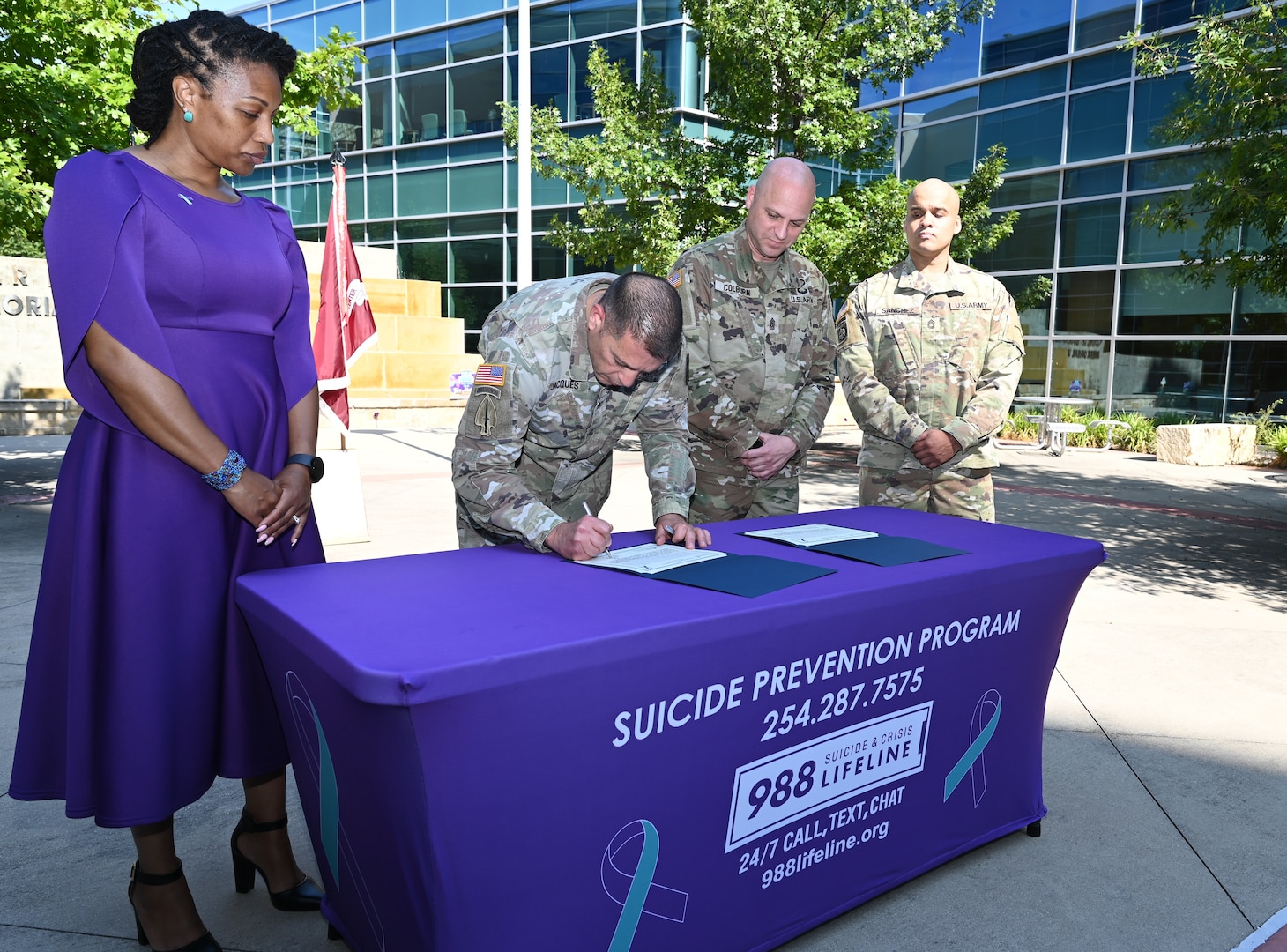 Col. Mark Jacques, CRDAMC commander, signs the 2025 Suicide Prevention Month proclamation on Sept. 18, pledging to protect the Fort Hood community and support those struggling with mental health challenges.