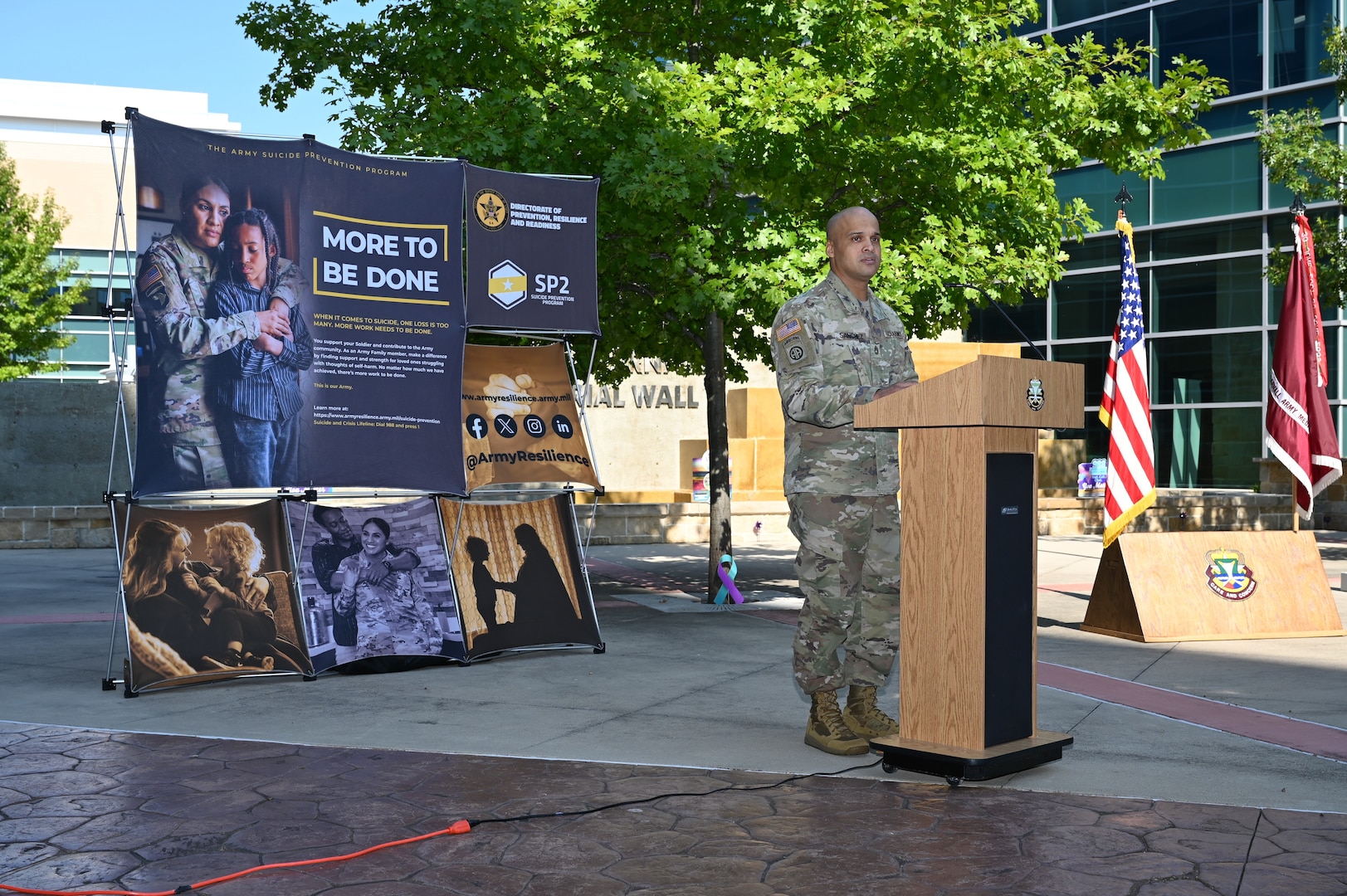 Sgt. 1st Class Etiel Sanchez, People Directorate NCOIC, shares his personal story of struggle and resilience, encouraging soldiers and civilians to seek help when needed during Suicide Prevention Month proclamation ceremony on Sept. 18.
