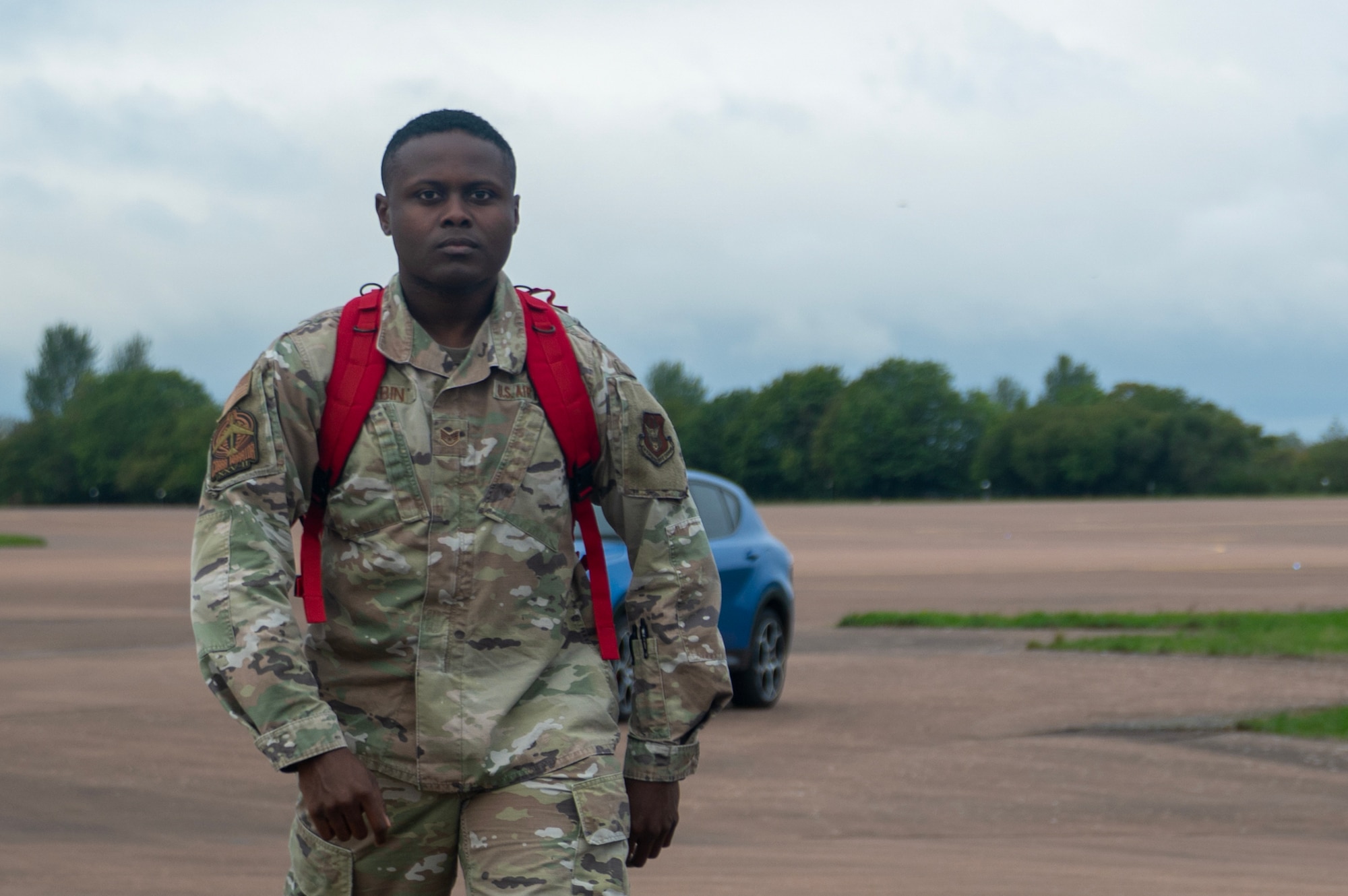 U.S. Air Force Staff Sgt. James Sabin, a cyber communications specialist assigned to the 307th Bomb Wing, Barksdale Air Force Base, Louisiana, transports communication equipment during Exercise Cobra Warrior 25-2 at RAF Fairford, England, Sept. 18, 2025. Cobra Warrior is a multinational exercise designed to enhance interoperability and strengthen relationships between Allied air forces. (U.S. Air Force photo by Staff Sgt. Tambri Cason)