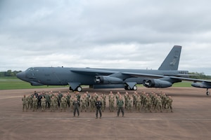 U.S. Air Force Airmen, assigned to the 307th Bomb Wing, Barksdale, Louisiana, stand in formation during Exercise Cobra Warrior 25-2 at RAF Fairford, England, Sept. 12, 2025. CW 25-2 provides U.S. forces an opportunity to train alongside NATO Allies and partners in a complex, multinational environment. (U.S. Air Force photo by Staff Sgt. Tambri Cason)