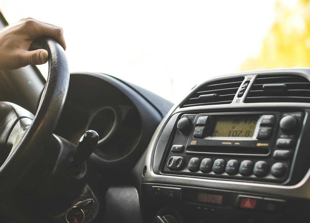 A person driving a car