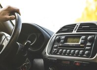 A person driving a car