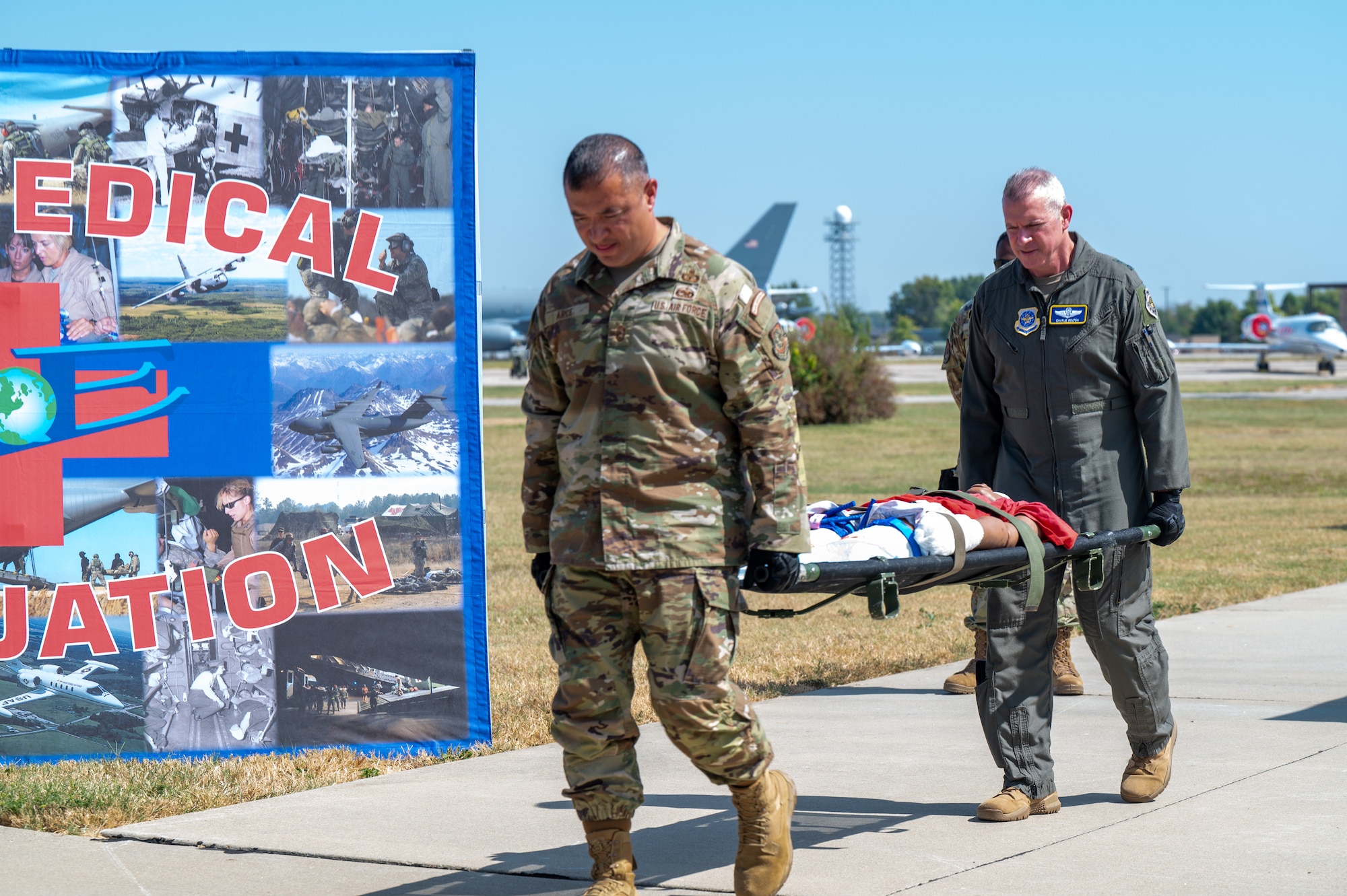 General and Chief carry a medical litter