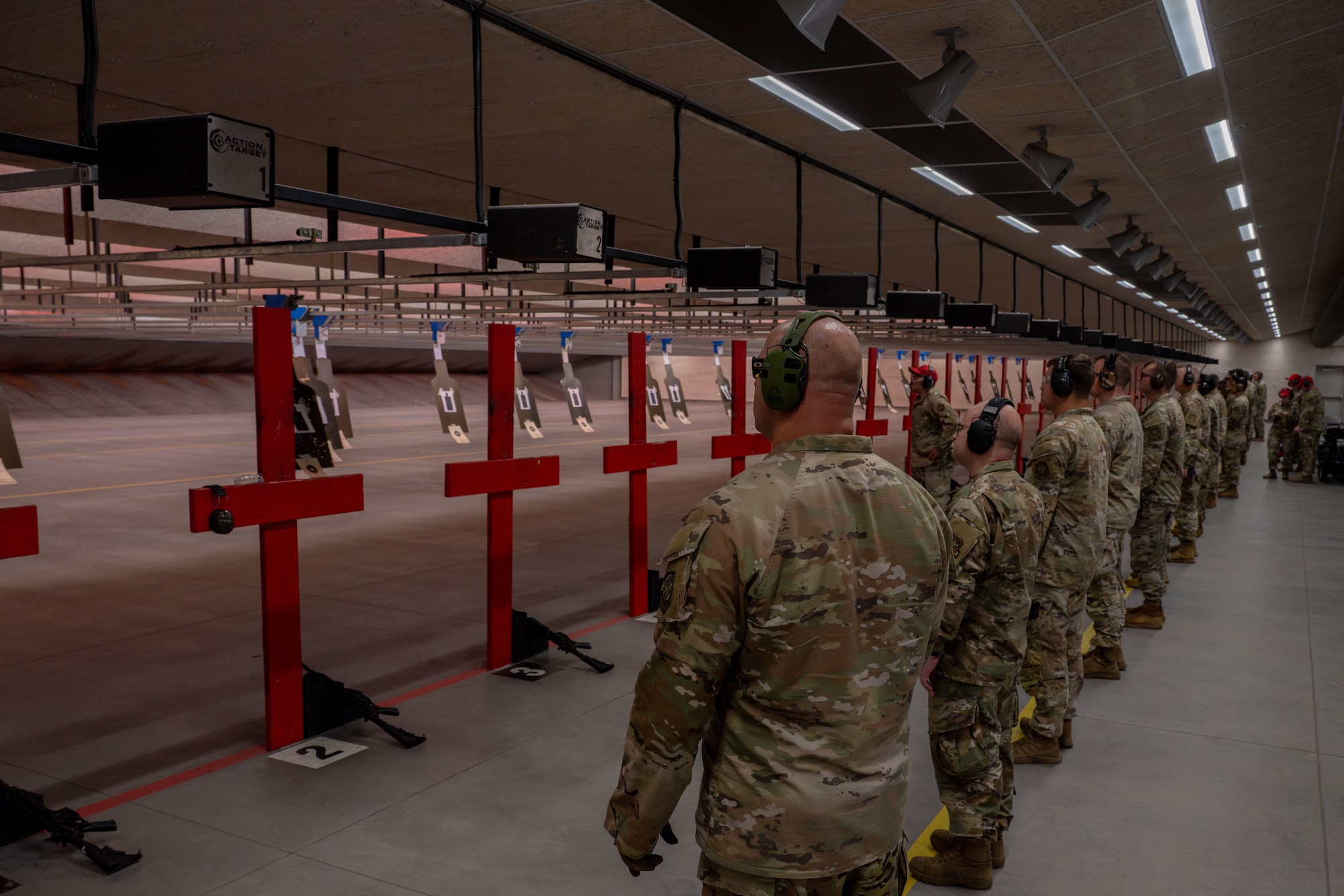 Team McConnell Airmen compete in the Rifle Elementary Excellence in Competition (EEIC) hosted by the 22nd Security Forces Squadron, McConnell Air Force Base, Kansas, Sept. 18, 2025. Nearly 100 competitors tested their marksmanship skills with the M4, with the top 10 percent of shooters earning an official letter of recognition from the Air Force Security Forces Center and the National Rifle Association. (U.S. Air Force photo by Airman 1st Class Paula Arce)