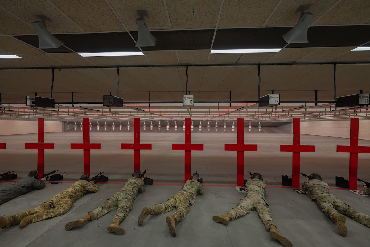 Team McConnell Airmen fire from the prone supported position during the Rifle Elementary Excellence in Competition (EEIC) hosted by the 22nd Security Forces Squadron, McConnell Air Force Base, Kansas, Sept. 18, 2025. Airmen were instructed to shoot 20 rounds of ammunition in 45 seconds during the rapid-fire round. (U.S. Air Force photo by Airman 1st Class Paula Arce)