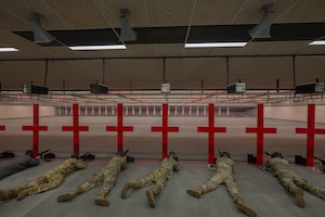 Team McConnell Airmen fire from the prone supported position during the Rifle Elementary Excellence in Competition (EEIC) hosted by the 22nd Security Forces Squadron, McConnell Air Force Base, Kansas, Sept. 18, 2025. Airmen were instructed to shoot 20 rounds of ammunition in 45 seconds during the rapid-fire round. (U.S. Air Force photo by Airman 1st Class Paula Arce)