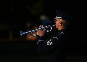 U.S. Air Force Tech. Sgt. Bradley Jones, premiere band trumpeter for The USAF Band, plays Taps during a POW/MIA remembrance ceremony at Joint Base Anacostia-Bolling, Washington, D.C., Sept. 19, 2025. According to the Defense POW/MIA Accounting Agency, less than 81,000 Americans remain missing from WWII, the Korean War, Vietnam War, Cold War, Gulf Wars and other conflicts. (U.S. Air Force photo by Tech. Sgt. Sergio A. Gamboa)