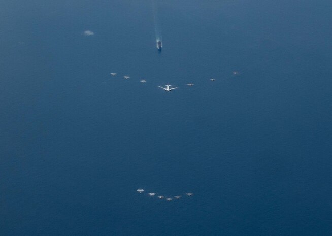 U.S. Air Force, U.S. Navy, Japan Air Self-Defense Force, and Republic of Korea Armed Forces aircraft fly in formation during Freedom Edge 25 over the Pacific Ocean, Sept. 16, 2025.