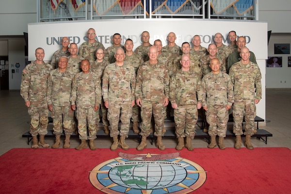 U.S. Air Force Maj. Gen. Joel Carey, chief of staff for U.S. Indo-Pacific Command, joins the 2025 State Partnership Program Senior Leader Forum for a group photo at USINDOPACOM headquarters on Camp H.M. Smith, Hawaii, Sept. 19, 2025. SPP is a Department of War security cooperation program managed by the Chief of the National Guard Bureau and executed by U.S. Indo-Pacific Command, directing the National Guard of the States and Territories to maintain 17 partnerships with nine states and one territory, supported by 12 Guardsmen serving as bilateral affairs officers in regional embassies. USINDOPACOM is committed to enhancing stability in the Indo-Pacific region by promoting security cooperation, encouraging peaceful development, responding to contingencies, deterring aggression and, when necessary, prevailing in conflict. (U.S. Army photo by Sgt. Austin Riel)