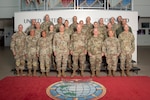 U.S. Air Force Maj. Gen. Joel Carey, chief of staff for U.S. Indo-Pacific Command, joins the 2025 State Partnership Program Senior Leader Forum for a group photo at USINDOPACOM headquarters on Camp H.M. Smith, Hawaii, Sept. 19, 2025. SPP is a Department of War security cooperation program managed by the Chief of the National Guard Bureau and executed by U.S. Indo-Pacific Command, directing the National Guard of the States and Territories to maintain 17 partnerships with nine states and one territory, supported by 12 Guardsmen serving as bilateral affairs officers in regional embassies. USINDOPACOM is committed to enhancing stability in the Indo-Pacific region by promoting security cooperation, encouraging peaceful development, responding to contingencies, deterring aggression and, when necessary, prevailing in conflict. (U.S. Army photo by Sgt. Austin Riel)