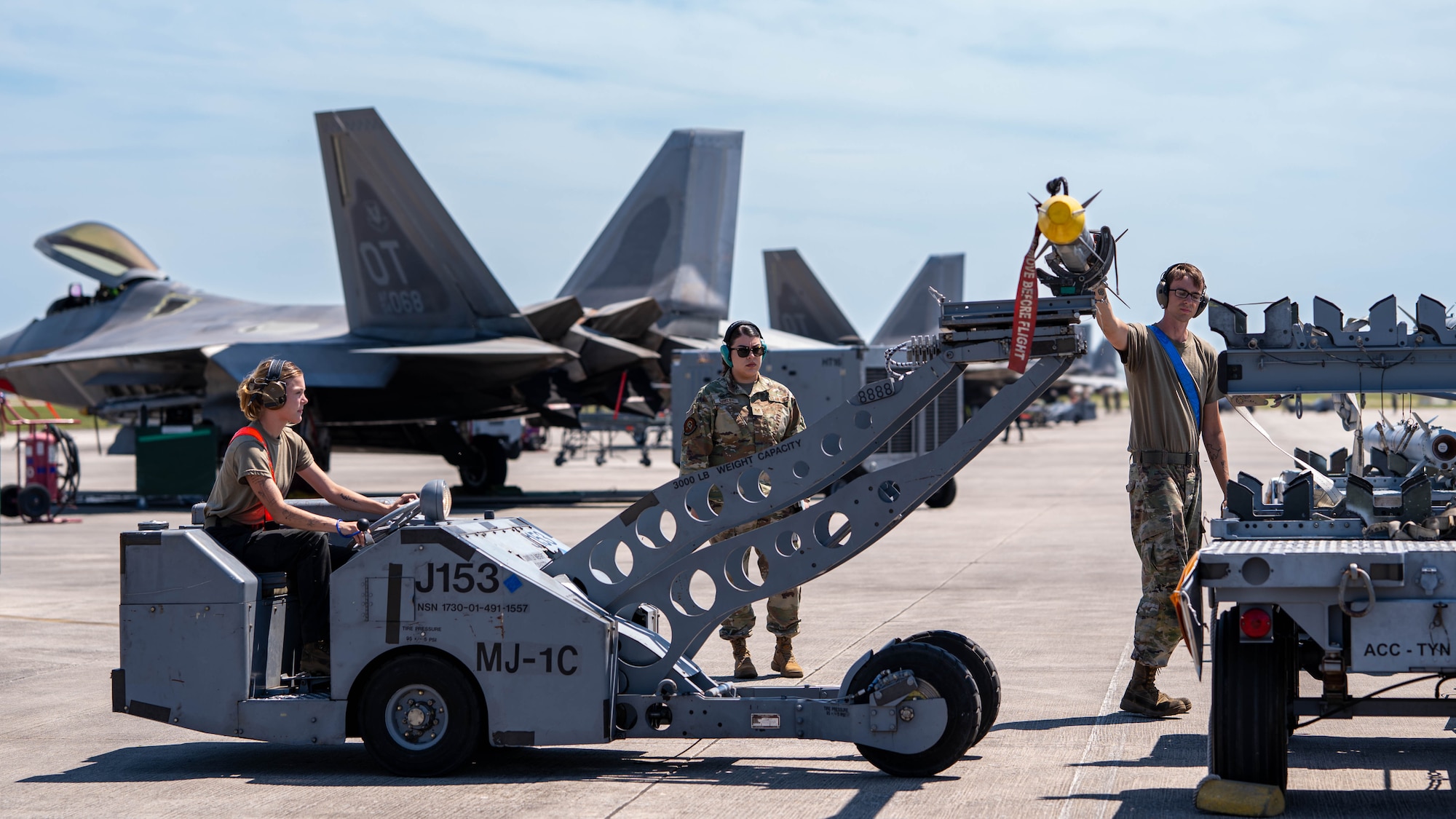Airmen return a missile to a transport cart during Weapons System Evaluation Program Combat Archer 25.09 at Tyndall Air Force Base.