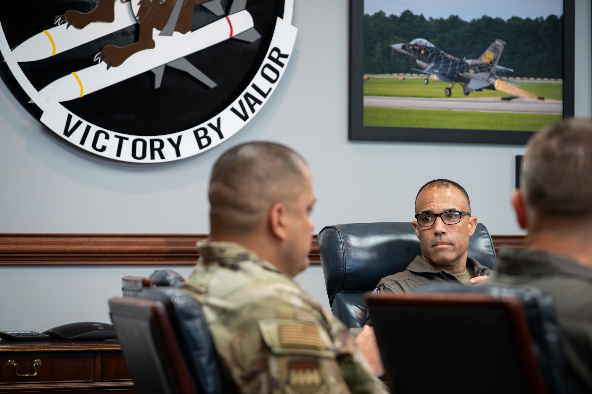 U.S. Air Force Gen. Adrian Spain commander of Air Combat Command, receives a briefing