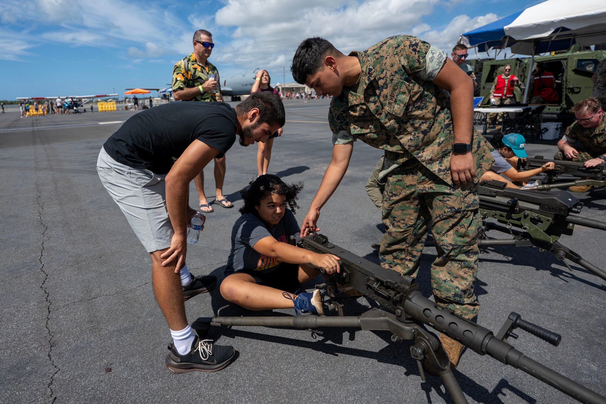 Marines show how to perform a weapon adjustment.