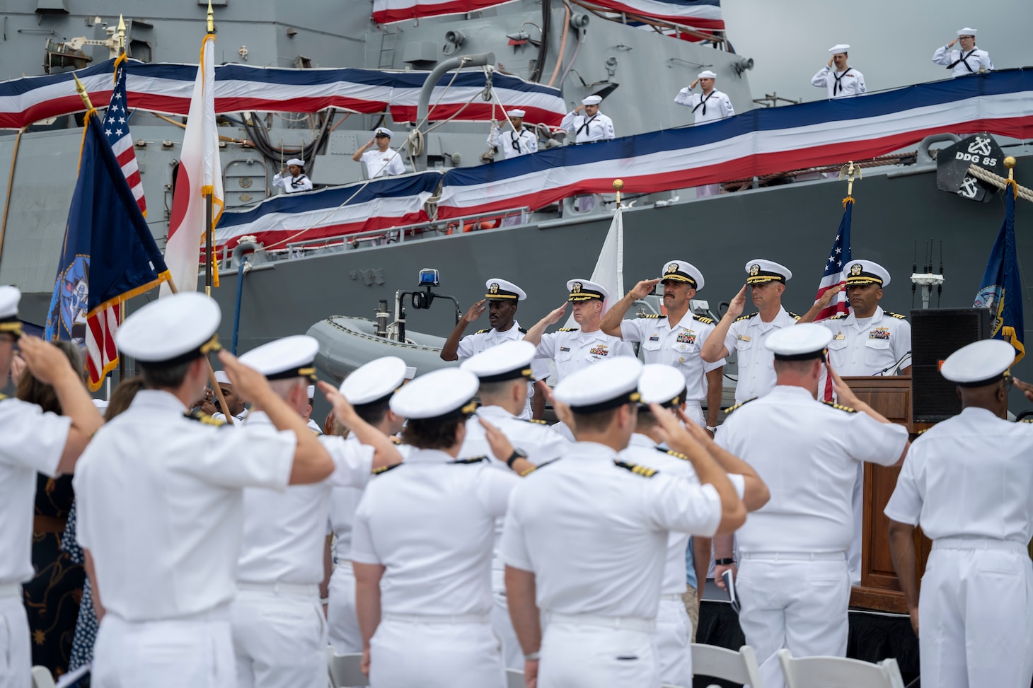 YOKOSUKA, Japan (Sept. 12, 2025) Members of the official party and Sailors assigned to the Arleigh Burke-class guided-missile destroyer USS McCampbell (DDG 85) salute the colors during a change of command ceremony at Commander, Fleet Activities Yokosuka, Japan, Sept. 12, 2025. McCampbell is assigned to the George Washington Carrier Strike Group (GWA CSG), forward deployed to the U.S. 7th Fleet area of operations. George Washington is the U.S. Navy’s premier forward-deployed aircraft carrier, a long-standing symbol of the United States’ commitment to maintaining a free and open Indo-Pacific region, while operating alongside allies and partners across the U.S. Navy’s largest numbered fleet. (U.S. Navy photo by Mass Communication Specialist 1st Class Taylor DiMartino)