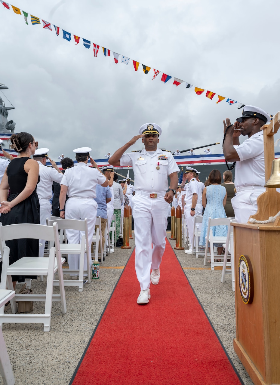 YOKOSUKA, Japan (Sept. 12, 2025) Cmdr. Jordan Stutzman, off-going commanding officer of the Arleigh Burke-class guided-missile destroyer USS McCampbell (DDG 85), is rung ashore as he departs a change of command ceremony at Commander, Fleet Activities Yokosuka, Japan, Sept. 12, 2025. McCampbell is assigned to the George Washington Carrier Strike Group (GWA CSG), forward deployed to the U.S. 7th Fleet area of operations. George Washington is the U.S. Navy’s premier forward-deployed aircraft carrier, a long-standing symbol of the United States’ commitment to maintaining a free and open Indo-Pacific region, while operating alongside allies and partners across the U.S. Navy’s largest numbered fleet. (U.S. Navy photo by Mass Communication Specialist 1st Class Taylor DiMartino)