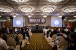SINGAPORE (Aug. 5, 2025) Rear Adm. Todd Cimicata, commander, Logistics Group Western Pacific/Task Force 73, gives remarks during the opening ceremony of Southeast Asia Cooperation and Training (SEACAT) in Singapore, Aug 5, 2025. SEACAT is a multilateral, multi-platform exercise including ashore and at-sea training evolutions emphasizing real-world engagements to enhance cooperation and maritime security capabilities in the Indo-Pacific. (U.S. Navy Photo by Mass Communications Specialist 2nd Class Jordan Jennings)