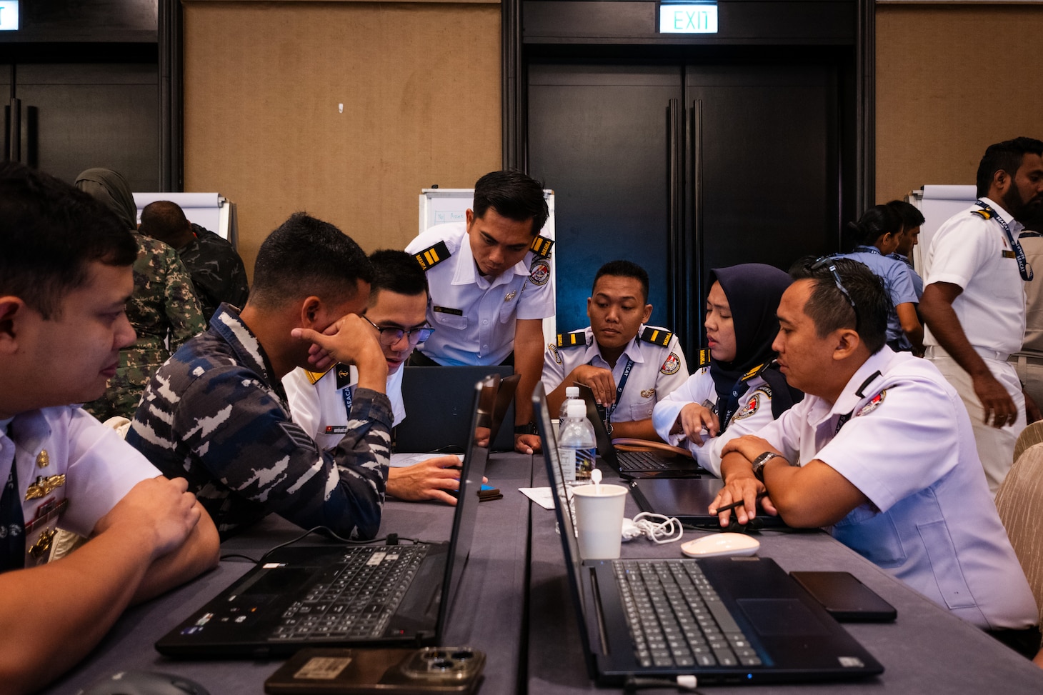 SINGAPORE (Aug. 7, 2025) Sailors from the Indonesian Sea and Coast Guard Unit participate in a sensing workshop during Southeast Asia Cooperation and Training (SEACAT) in Singapore, Aug. 7, 2025. SEACAT is a multilateral, multi-platform exercise including ashore and at-sea training evolutions emphasizing real-world engagements to enhance cooperation and maritime security capabilities in the Indo-Pacific. (U.S. Navy Photo by Mass Communications Specialist 2nd Class Jordan Jennings)