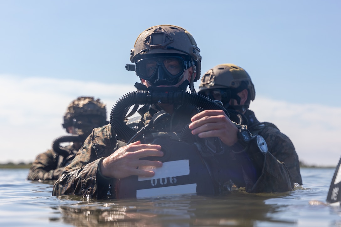 U.S. Marine Corps Sgt. Brandt Brock, a reconnaissance Marine with 3rd Force Reconnaissance Company, 4th Marine Division, Marine Corps Forces Reserve, and a native of Texas, treads water while conducting dive operations as part of exercise UNITAS 2025 at Marine Corps Base Camp Lejeune, North Carolina, Sept. 18, 2025. UNITAS, which is Latin for “unity,” was conceived in 1959 and has taken place annually since first conducted in 1960. This marks the 66th iteration of the world’s longest running annual multinational maritime exercise. (U.S. Marine Corps photo by Lance Cpl. Jack Labrador)