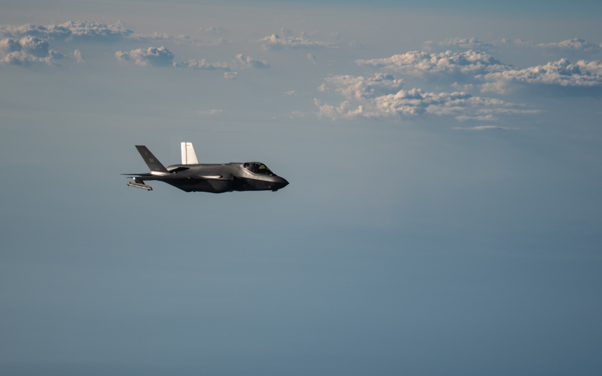 A U.S. Air Force F-35A Lightning II assigned to the 6th Weapons Squadron prepares to receive fuel from a KC-135 Stratotanker assigned to the 91st Air Refueling Squadron during exercise Combat Archer, Sept. 12, 2025, over the Gulf of America. The 6th Air Refueling Wing extends the endurance of F-22 Raptors and F-35 Lightning IIs during Exercise Combat Archer, allowing fighters to complete live-fire training without interruption. This mission showcases AMC’s role as a global force multiplier, delivering the speed, range, and flexibility that underpin U.S. airpower in contested environments.  (U.S. Air Force photo by Tech. Sgt. Alexander Cook)