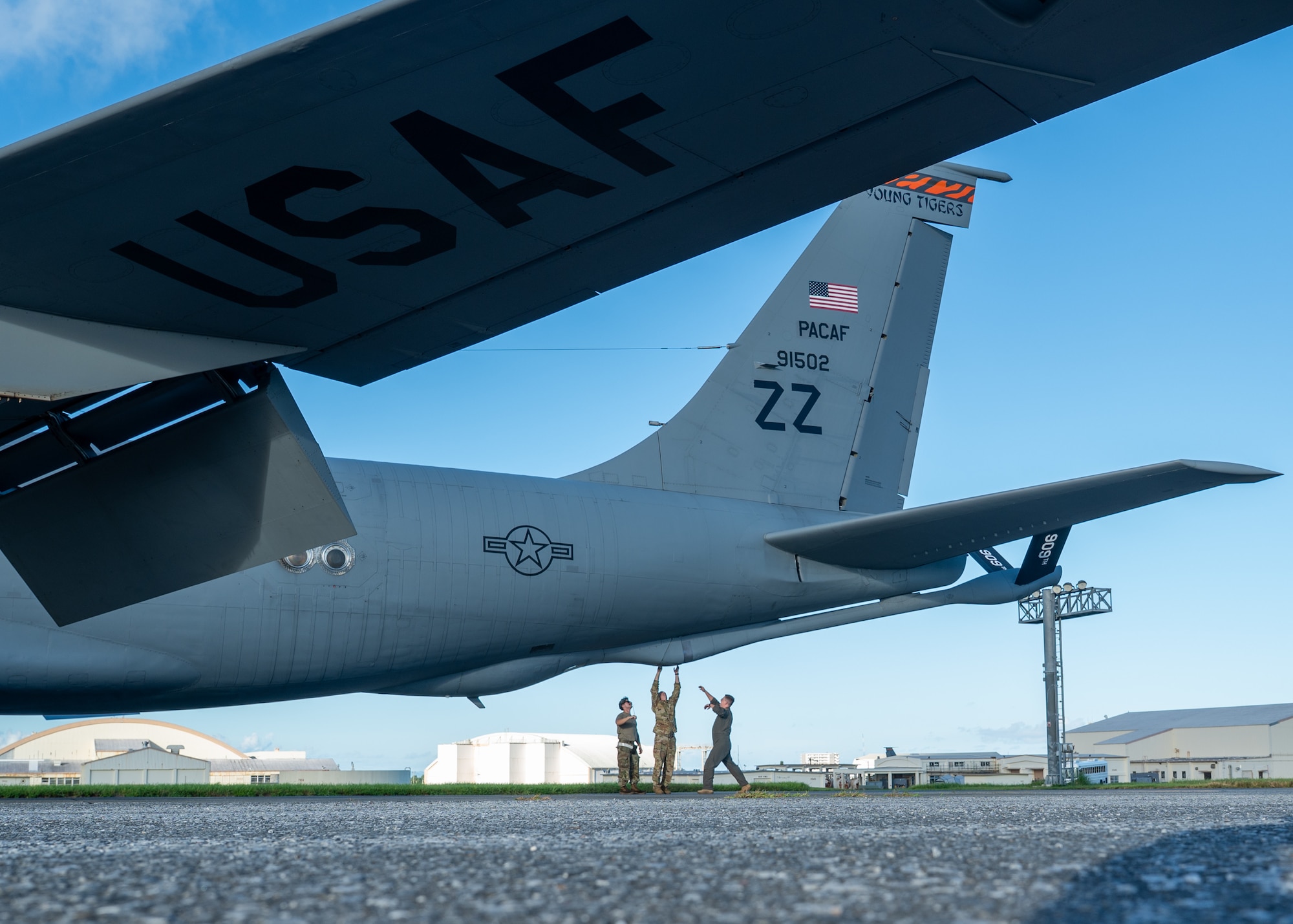 U.S. Air Force Airmen perform pre-flight checks on a KC-135 Stratotanker.