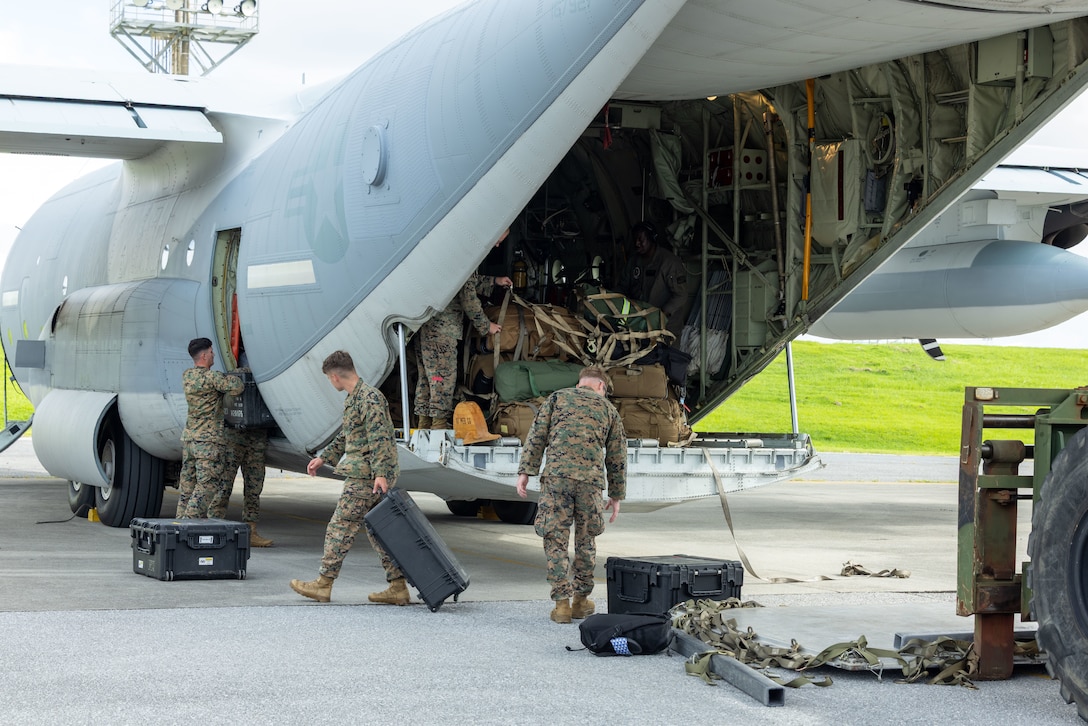 U.S. Marines with 3D Marine Expeditionary Brigade load cargo from a 463L master pallet onto a KC-130J Super Hercules during an Alert Contingency Marine Air-Ground Task Force (ACM) drill in preparation for exercise Resolute Dragon 25 at Kadena Air Base, Okinawa, Japan, Sept. 11, 2025. An ACM drill is a rapid-reaction training exercise to maintain a ready force that can deploy immediately in response to crisis. RD25 is an annual bilateral exercise in Japan that strengthens the command, control, and multi-domain maneuver capabilities of Marines in III Marine Expeditionary Force and allied Japan Self-Defense Force personnel.  (U.S. Marine Corps photo by Sgt. Nicholas A. Cox)