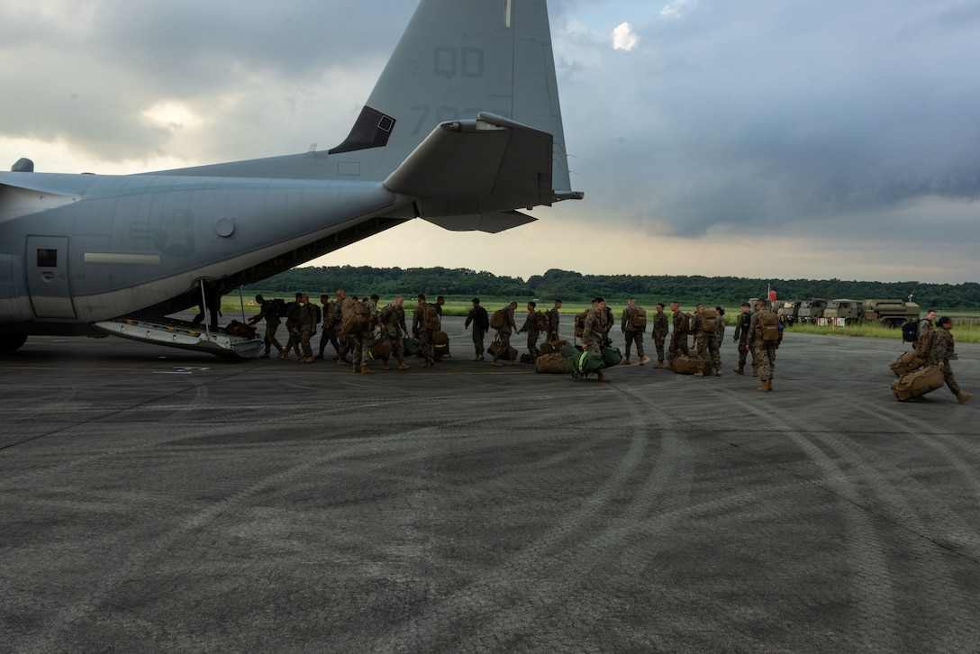 U.S. Marines with 3D Marine Expeditionary Brigade unload cargo from a KC-130J Super Hercules during an Alert Contingency Marine Air-Ground Task Force (ACM) drill in preparation for exercise Resolute Dragon 25 at Kumamoto, Kyushu, Japan, Sept. 11, 2025. An ACM drill is a rapid-reaction training exercise to maintain a ready force that can deploy immediately in response to crisis. Resolute Dragon is an annual bilateral exercise in Japan that strengthens the command, control, and multi-domain maneuver capabilities of Marines in III Marine Expeditionary Force and allied Japan Self-Defense Force personnel.  (U.S. Marine Corps photo by Sgt. Nicholas A. Cox)