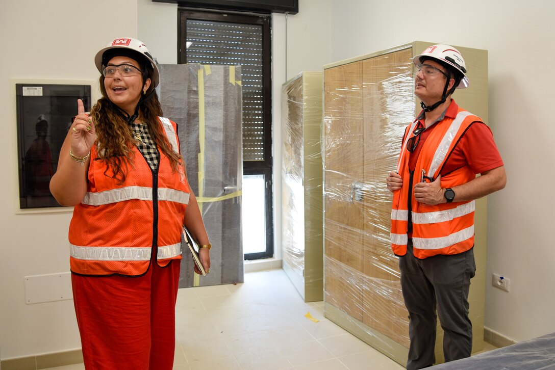 two Europe district employees talking