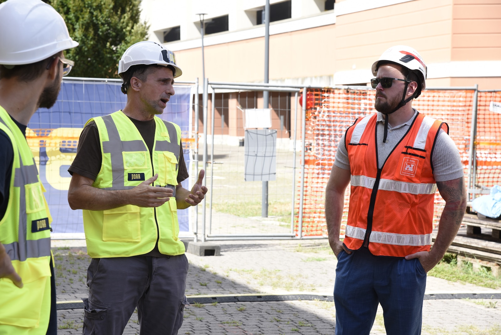 Europe District employee speaking with contractors