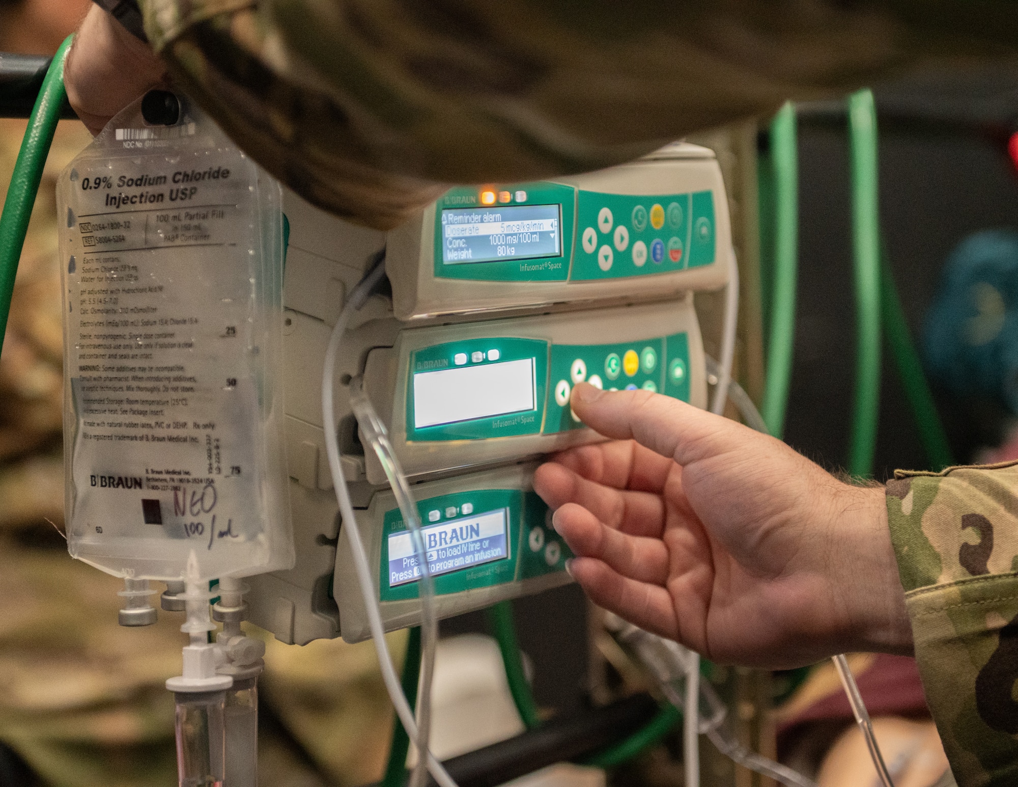 U.S. Air Force Capt. Greg Fellows, a student at the Critical Care Air Transport Teams (CCATT) training course operates an infusion pump in St. Paul, Minn., Aug. 11, 2025.