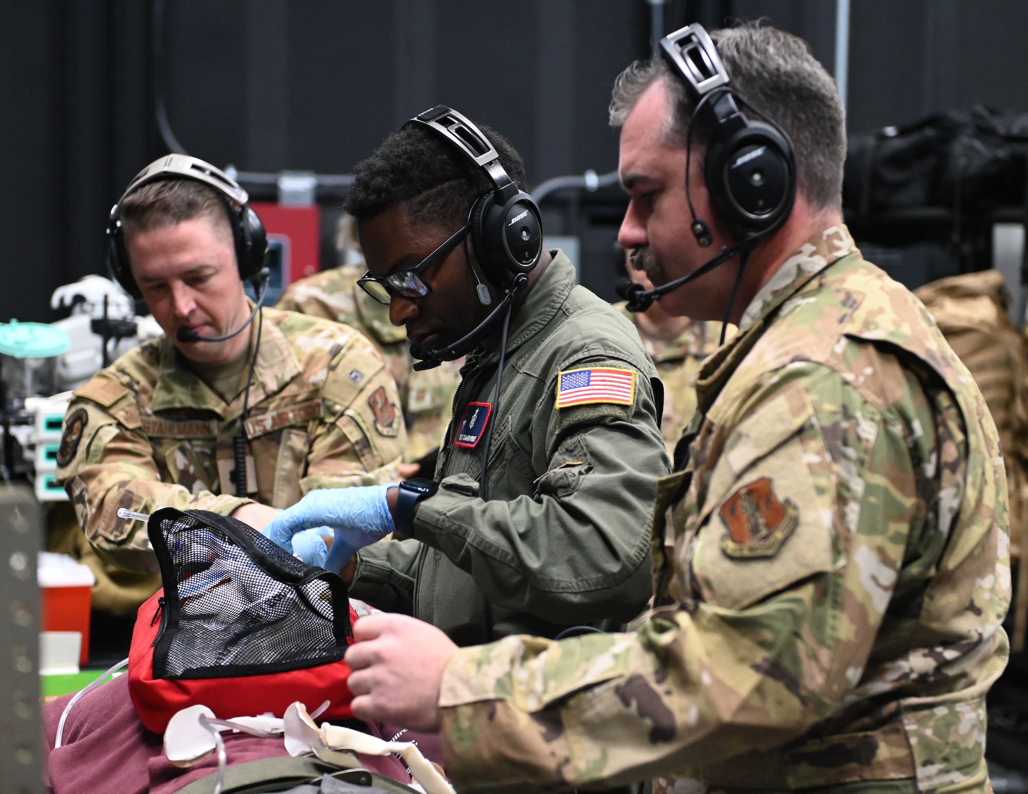 U.S. Air Force students and instructors from the Critical Care Air Transport Teams (CCATT) training course search for medical supplies in St. Paul, Minn., Aug. 11, 2025.
