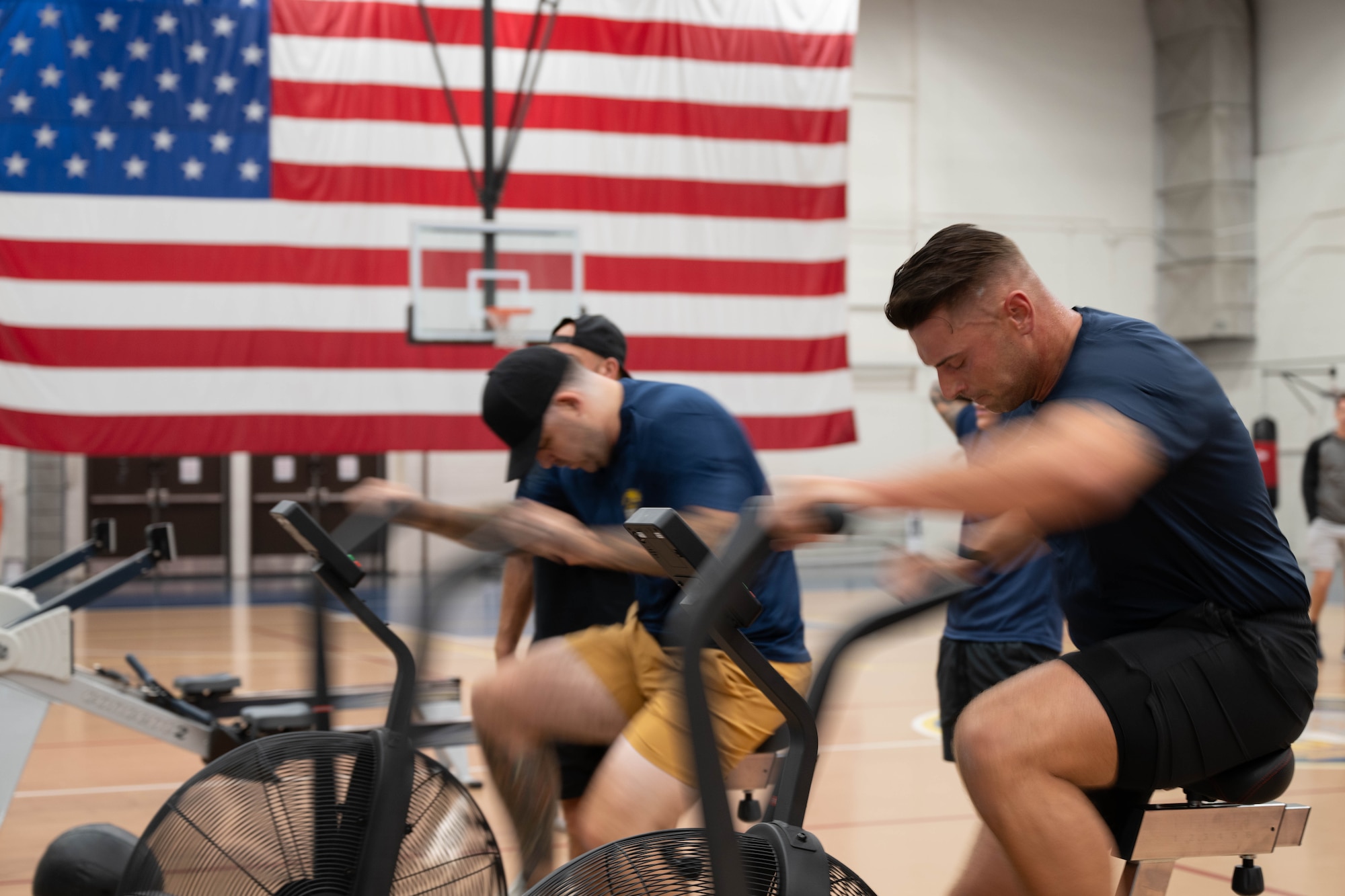 Personnel from Berkeley Township Police Department and Toms River Police Department compete against each other during the 87th Force Support Squadron’s 1st Annual Lakehurst Fitness Day Challenge at Joint Base McGuire-Dix-Lakehurst, N.J., Sept. 17, 2025. The 87th FSS event challenged several off-base police departments to complete a series of exercises, fostering collaboration with our mission partners. (U.S. Air Force Senior Airman Aidan Thompson)