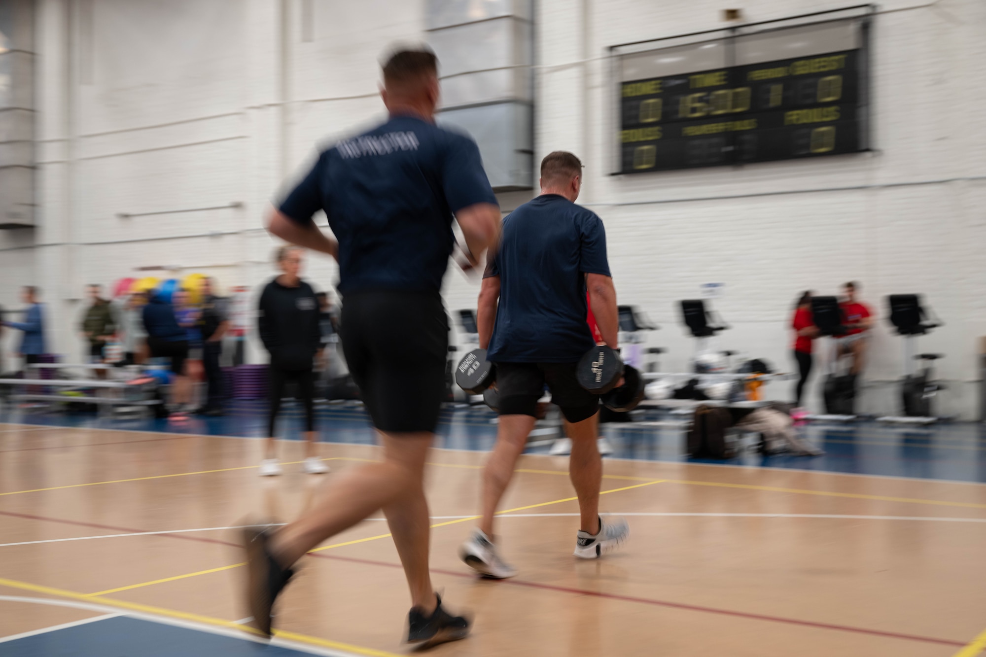 Personnel from Berkeley Township Police Department and Toms River Police Department compete against each other during the 87th Force Support Squadron’s 1st Annual Lakehurst Fitness Day Challenge at Joint Base McGuire-Dix-Lakehurst, N.J., Sept. 17, 2025. The 87th FSS event challenged several off-base police departments to complete a series of exercises, fostering collaboration with our mission partners. (U.S. Air Force Senior Airman Aidan Thompson)