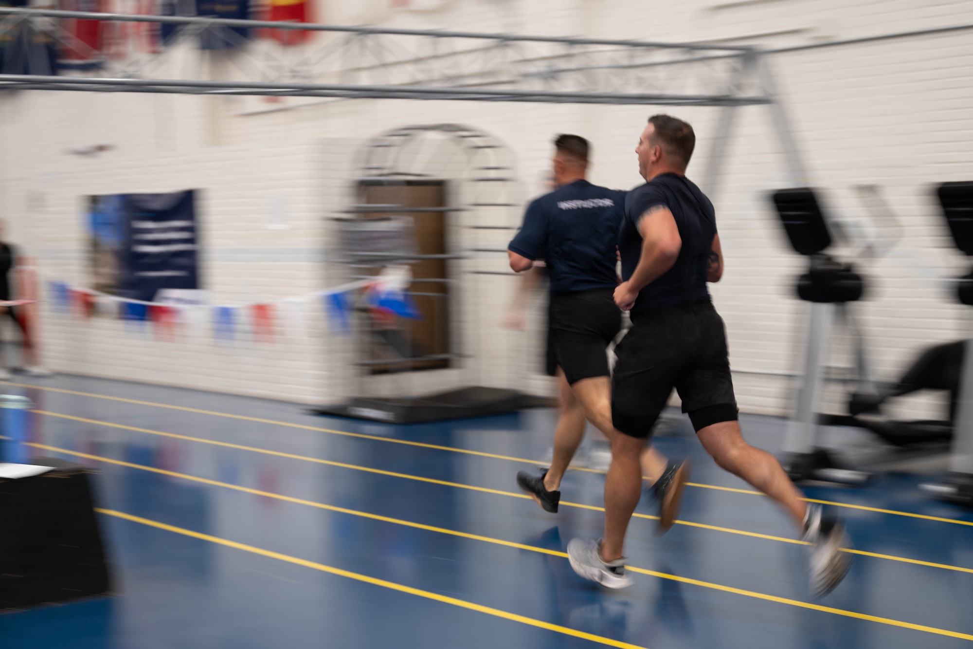 Personnel from Berkeley Township Police Department and Toms River Police Department compete against each other during the 87th Force Support Squadron’s 1st Annual Lakehurst Fitness Day Challenge at Joint Base McGuire-Dix-Lakehurst, N.J., Sept. 17, 2025. The 87th FSS event challenged several off-base police departments to complete a series of exercises, fostering collaboration with our mission partners. (U.S. Air Force Senior Airman Aidan Thompson)