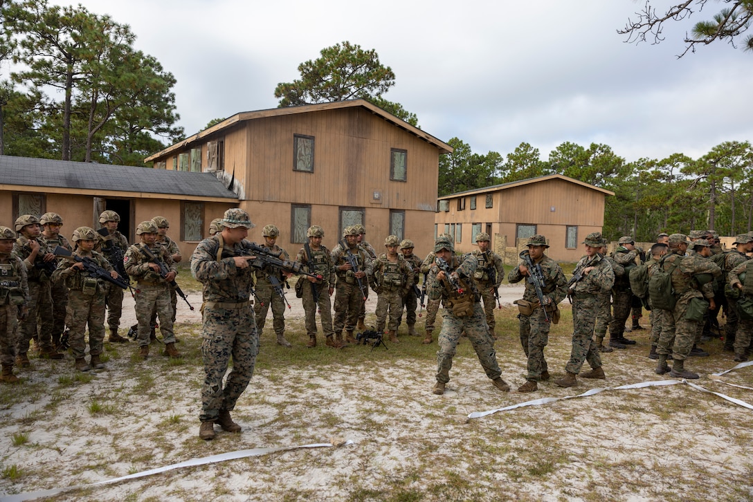 U.S. Marines with 2nd Battalion, 2nd Marine Regiment, demonstrate how they conduct room clearing while participating in urban operations training during exercise UNITAS 2025 at Marine Corps Base Camp Lejeune, North Carolina, Sept. 18, 2025. UNITAS, which is Latin for “unity,” was conceived in 1959 and has taken place annually since first conducted in 1960. This year marks the 66th iteration of the world’s longest-running annual multinational maritime exercise. (U.S. Marine Corps photo by Lance Cpl. Payton Goodrich)