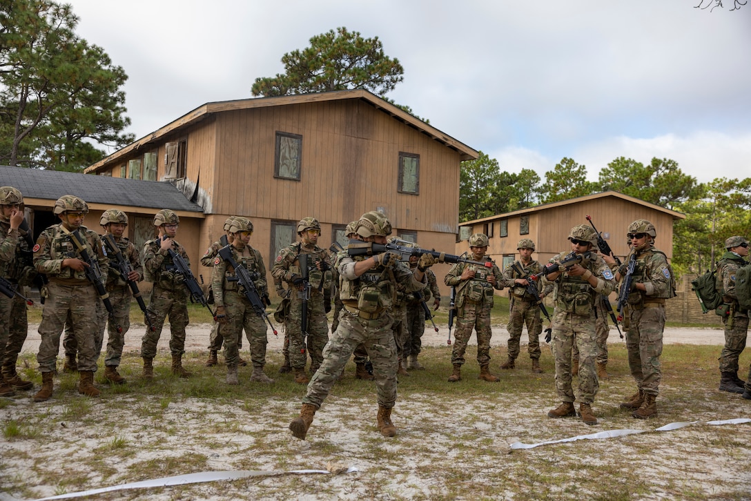 Marines with Infantería de Marina Colombiana (Colombian marines) demonstrate how they conduct room clearing while participating in urban operations training, during exercise UNITAS 2025 at Marine Corps Base Camp Lejeune, North Carolina, Sept. 18, 2025. UNITAS, which is Latin for “unity,” was conceived in 1959 and has taken place annually since first conducted in 1960. This year marks the 66th iteration of the world’s longest-running annual multinational maritime exercise. (U.S. Marine Corps photo by Lance Cpl. Payton Goodrich)
