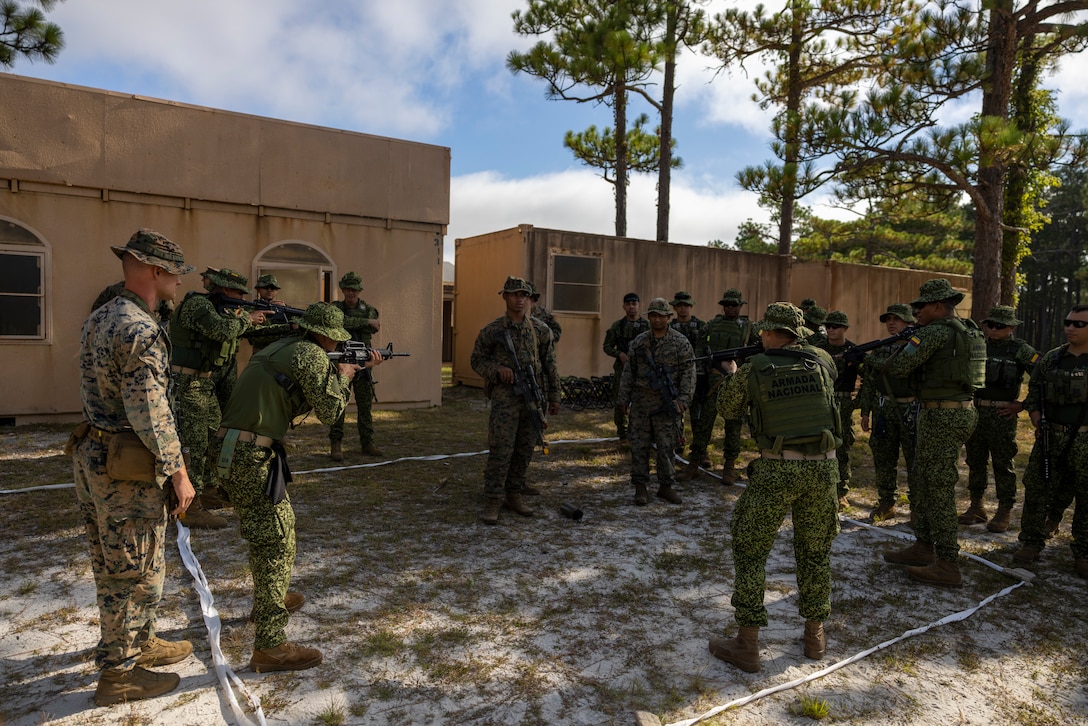 Marines with Infantería de Marina Colombiana (Colombian marines) conduct urban operations training during exercise UNITAS 2025 at Marine Corps Base Camp Lejeune, North Carolina, Sept. 18, 2025. UNITAS, which is Latin for “unity,” was conceived in 1959 and has taken place annually since first conducted in 1960. This year marks the 66th iteration of the world’s longest-running annual multinational maritime exercise. (U.S. Marine Corps photo by Lance Cpl. Payton Goodrich)