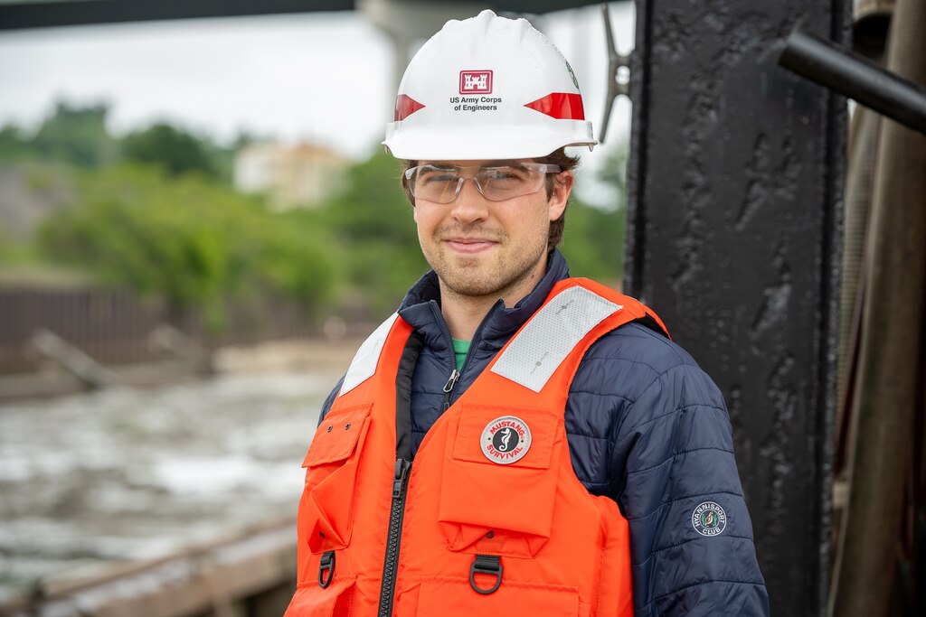 U.S. Army Corps of Engineers, Buffalo District Army Fellow John Kubiak participates in a quality assurance inspection during dredging of the Cuyahoga River in Cleveland