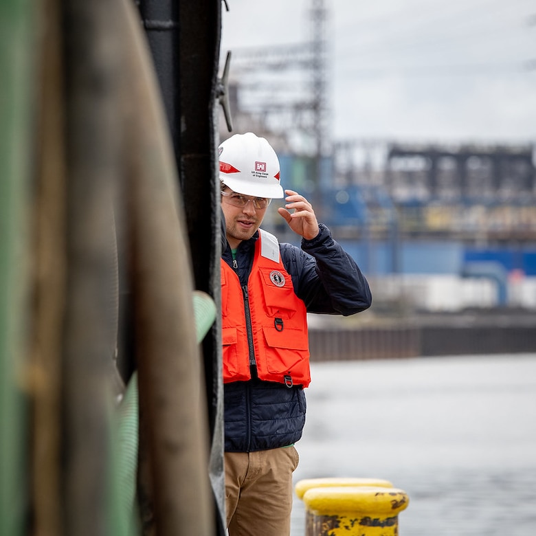 U.S. Army Corps of Engineers, Buffalo District Army Fellow John Kubiak participates in a quality assurance inspection during dredging of the Cuyahoga River in Cleveland.