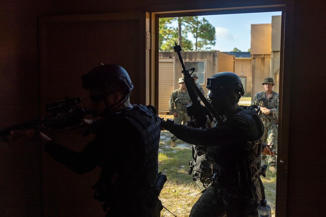 Marines with Cuerpo de Infantería de Marina (Chilean marine corps) practice urban terrain training during exercise UNITAS 2025 at Marine Corps Base Camp Lejeune, North Carolina, Sept. 19, 2025. UNITAS, which is Latin for “unity,” was conceived in 1959 and has taken place annually since first conducted in 1960. This year marks the 66th iteration of the world’s longest running annual multinational maritime exercise. (U.S. Marine Corps photo by Lance Cpl. Payton Goodrich)