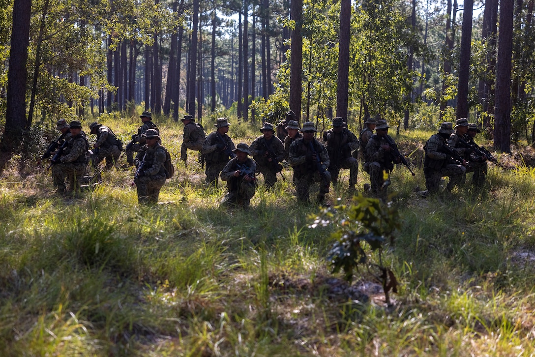 Marines with Infantería de Marina Colombiana (Colombian marines) set a security position while practicing urban terrain training, during exercise UNITAS 2025 at Marine Corps Base Camp Lejeune, North Carolina, Sept. 19, 2025. UNITAS, which is Latin for “unity,” was conceived in 1959 and has taken place annually since first conducted in 1960. This year marks the 66th iteration of the world’s longest running annual multinational maritime exercise. (U.S. Marine Corps photo by Lance Cpl. Payton Goodrich)